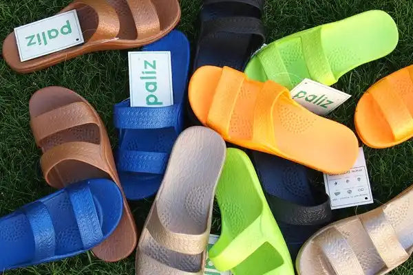 Colorful assortment of slide sandals.