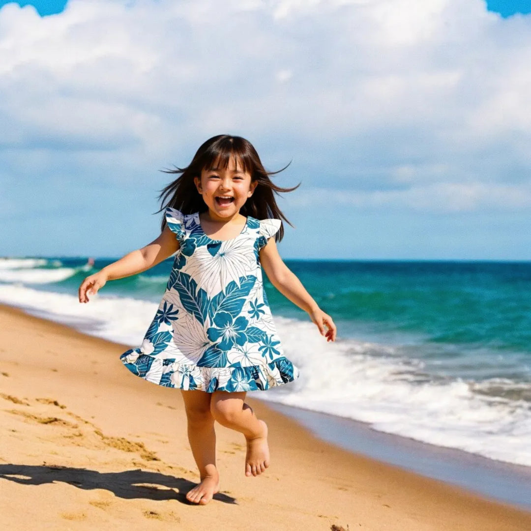 Haven Blue Hawaiian Girl Cotton Dress with Playful Floral Lavahut Haven Blue Hawaiian Girl Cotton Dress with Playful Floral Lavahut