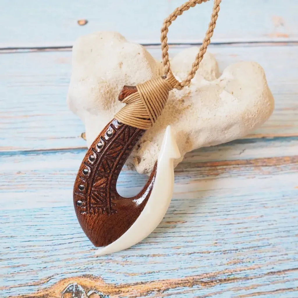 bone fish hook mythology Maori Design Whale by Alex Sands silverferngallery rooted connection to the ocean. Moana Koa Wood Fish Hook