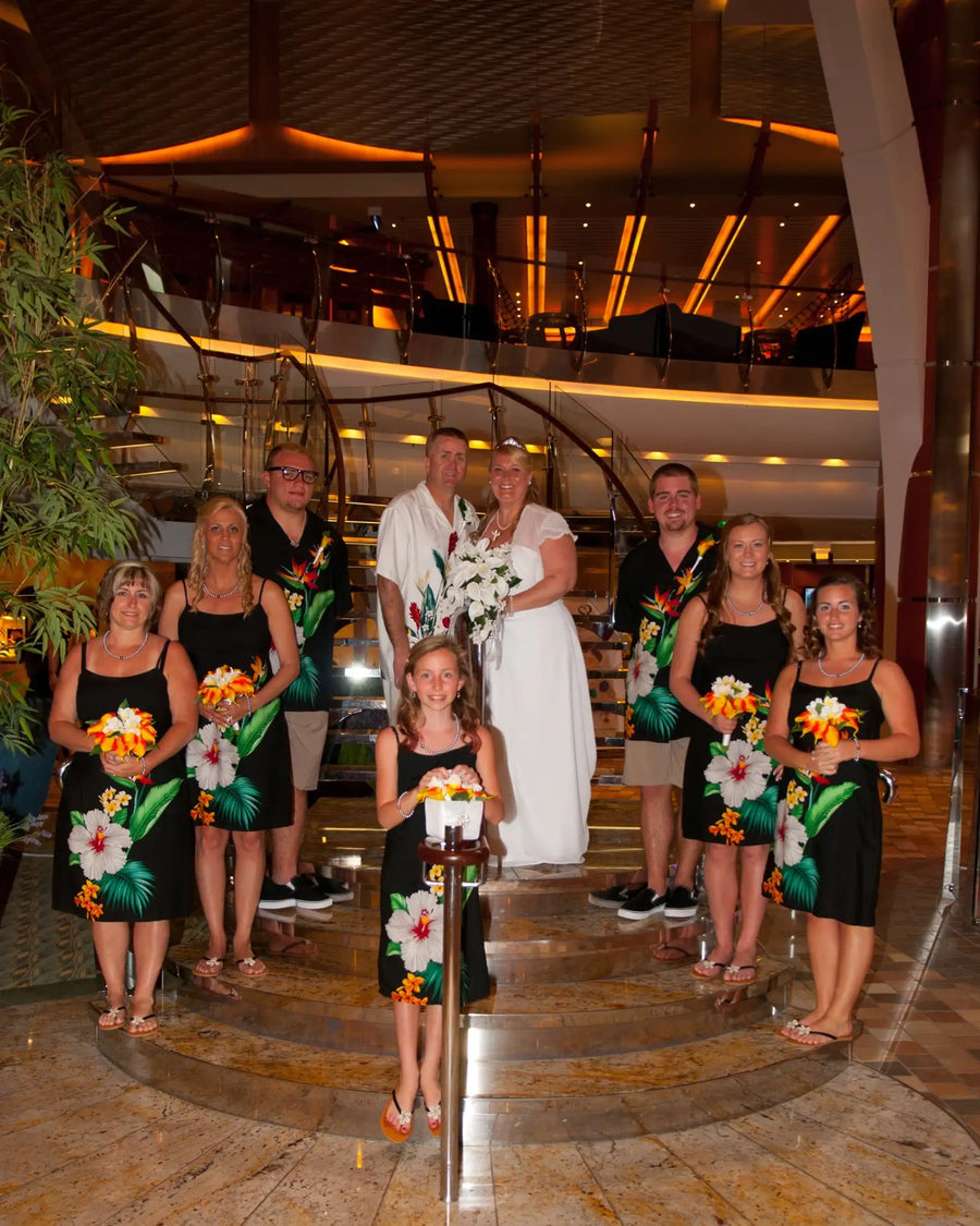 White wedding gown with a fitted bodice and flowing skirt.